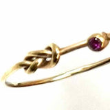 Estate size 7 14K Yellow Gold Band Knotted Red Gem Ring