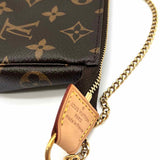 LOUIS VUITTON 2016 Mini Pochette Accessoires Coated Canvas Brown Monogram Clutch