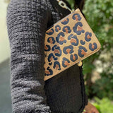 LOUIS VUITTON Wild at Heart Brown Black Leopard Empreinte Leather Clutch