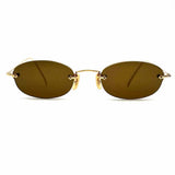 Calvin Klein Gold Tone Rimless Oval Sunglasses