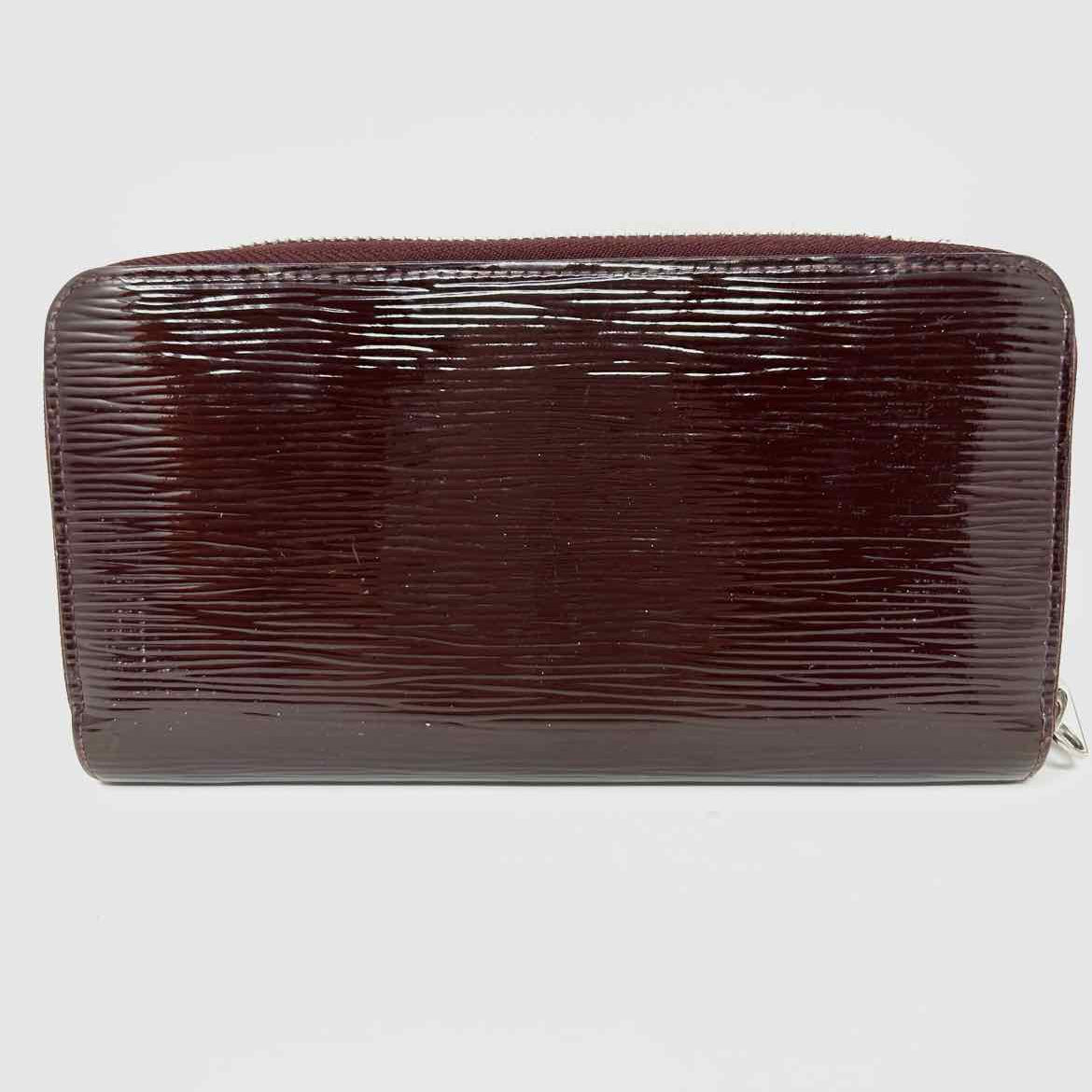 LOUIS VUITTON 2012 Zippy Burgundy Epi Electric Leather Wallet