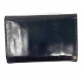 HOBO INTERNATIONAL Black Compact Kisslock Leather Wallet